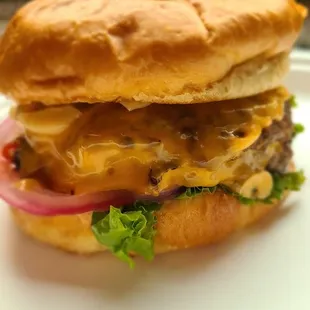 Smokey Burger Lettuce, tomatoes, cheddar cheese and smokey mayo sauce.