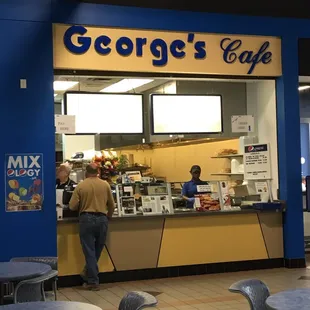 a man standing at the counter
