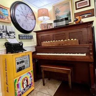 a piano and a clock