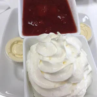 Side of strawberries and whip for pancakes