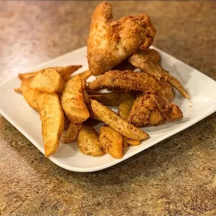 fried chicken wings and french fries