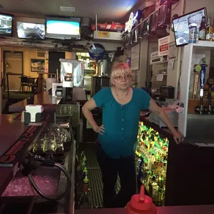 Listening intently to one of her regular's stories.