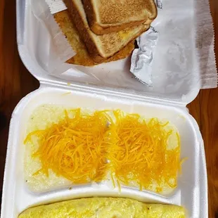 Western omelet,  cheese grits, hashbrown, and toast.
