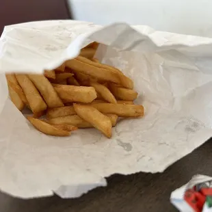 french fries in a paper bag