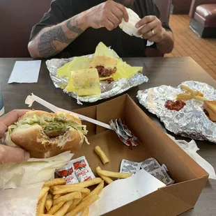 Pastrami, cheeseburger, fries, grilled cheese sandwich &amp; chocolate shake
