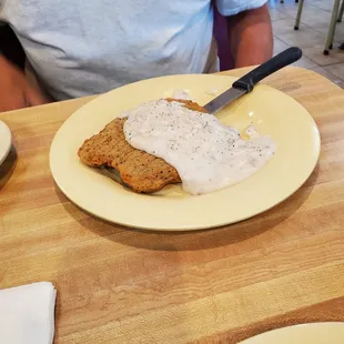 Country fried chopped steak with delicious gravy
