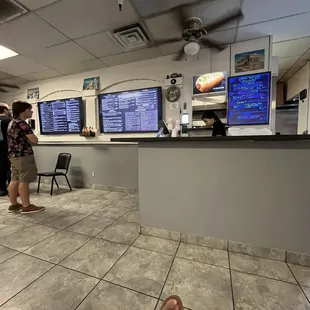 a man sitting in front of the counter