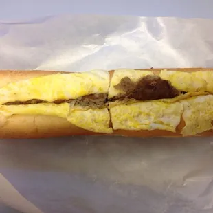 scrapple egg and cheese on a long roll