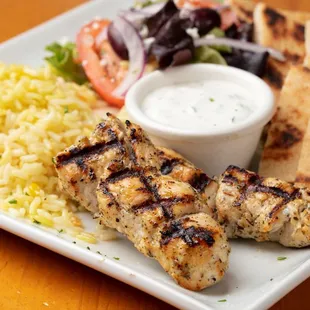 chicken skewers and rice