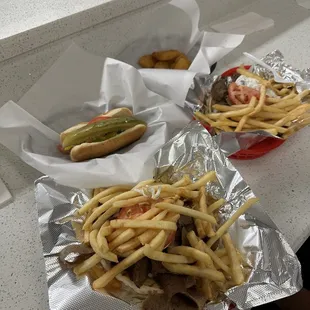 Gyros with fries on top, hot dog and mac &amp; cheese bites