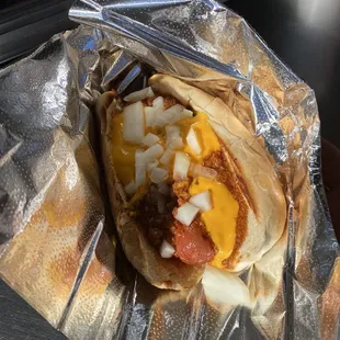 Coney dog with cheese and onions