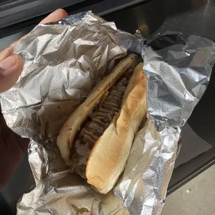 Kraut dog with brown mustard