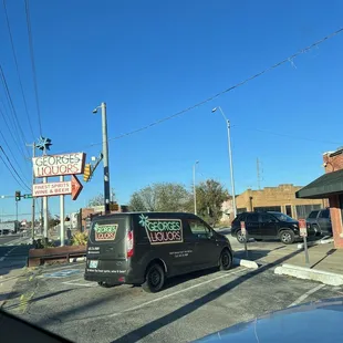 Store sign &amp; delivery service vehicle