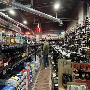 a man shopping in a liquor store