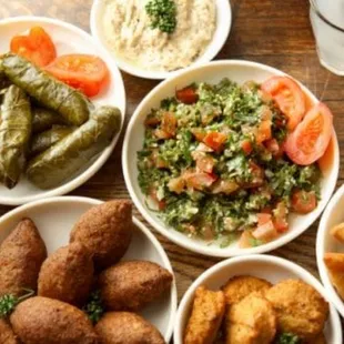 Kibbe balls, grape leaves,Tabouli, pitta bread, hummus, babaganoush