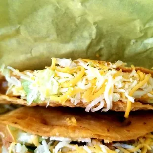 Mini Tacos Shredded and ground beef. Don't get the ground beef!  Cheap Eats in HB