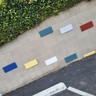 Even the parking lot walls have fun, festive colors adding to the character.