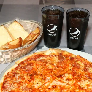 a pizza and two sodas