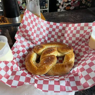 Housemade soft pretzel and delicious queso