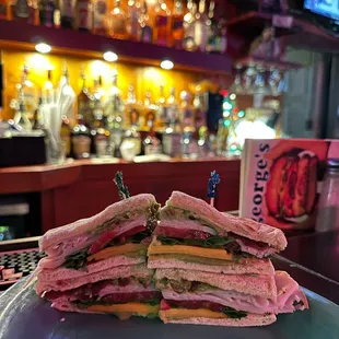 a cut in half sandwich on a plate