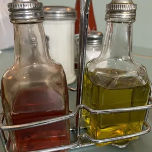 two bottles of olive oil and vinegar