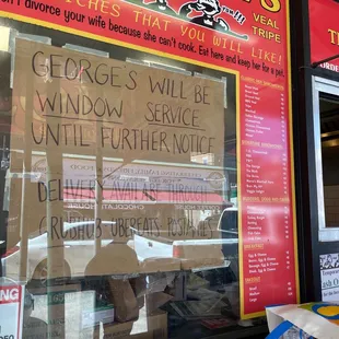 a sign in the window