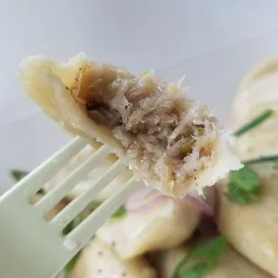 Inside a mushroom sauerkraut pierogie