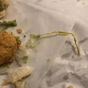 Shrimp poboy w/ wire twist tie.