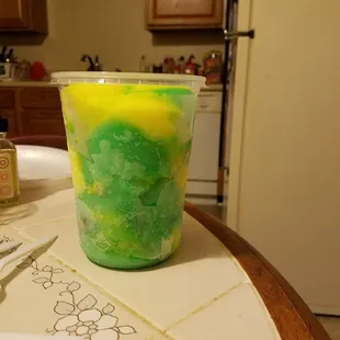 a green and yellow drink