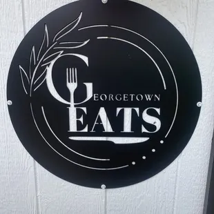 a sign for georgetown eats