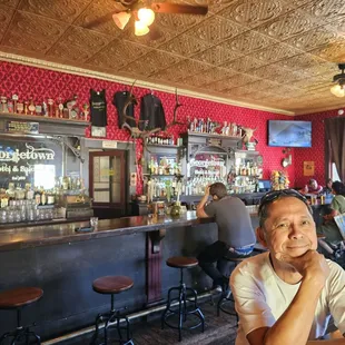a man sitting at a bar
