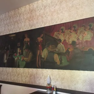 The mural is haunted.