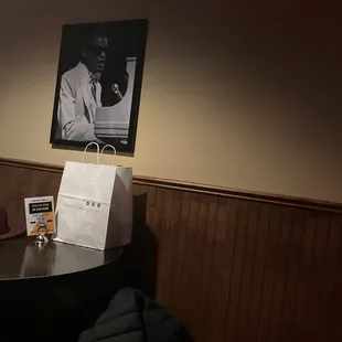 a photograph of a man playing the piano