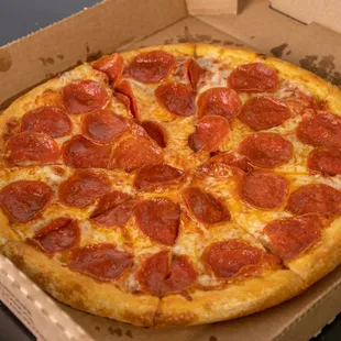 a pepperoni pizza in a box