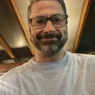 Mark L.