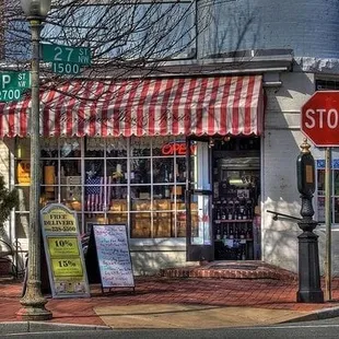 Look for the striped awning!