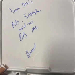 a handwritten message on a tray