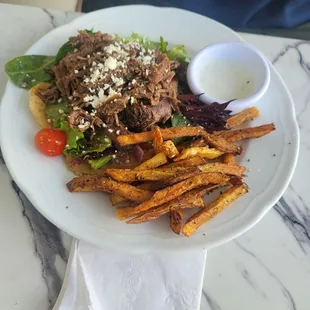 Lamb souvlaki with fries