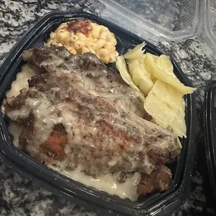 *Smothered Turkey Wings-wings are on a bed of rich; Cabbage and Mac &amp; Cheese on side