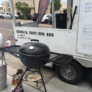 a bbq on a street corner