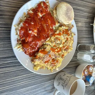 Meat lovers omelette.    With hash browns and an American Muffin. Ooorah.  Fat Phuck stamp of approval.