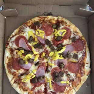 pepperoni, sausage, mushrooms, and cheese