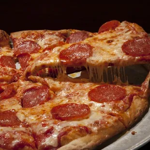a slice of pepperoni pizza