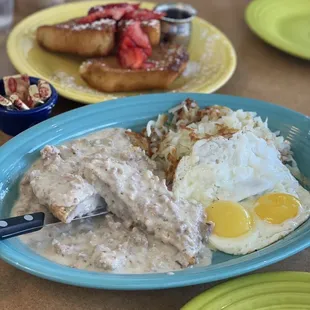 Chicken fried steak and eggs  French toast w/ strawberries