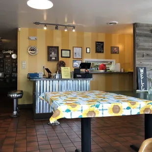 a table and chairs in a restaurant