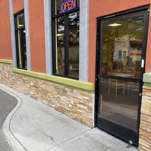 the entrance to a restaurant