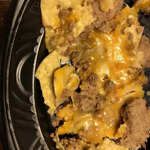 Nachos missing lettuce, jalapeños and Guacamole Dip