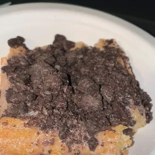 The churro stand is next to the taco truck, same owner. Very satisfying. We had told him to add in Oreos and some white kind of syrup.