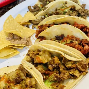 2 Tacos Tripas, 2 Tacos Al Pastor and 2 Tacos Carne Asada