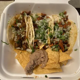 Birria Taco is on far left and the 2 right are the Al Pastor Tacos